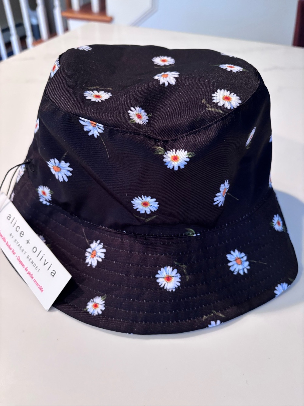 Alice + Olivia Black Bucket Hat with White Daisy Print